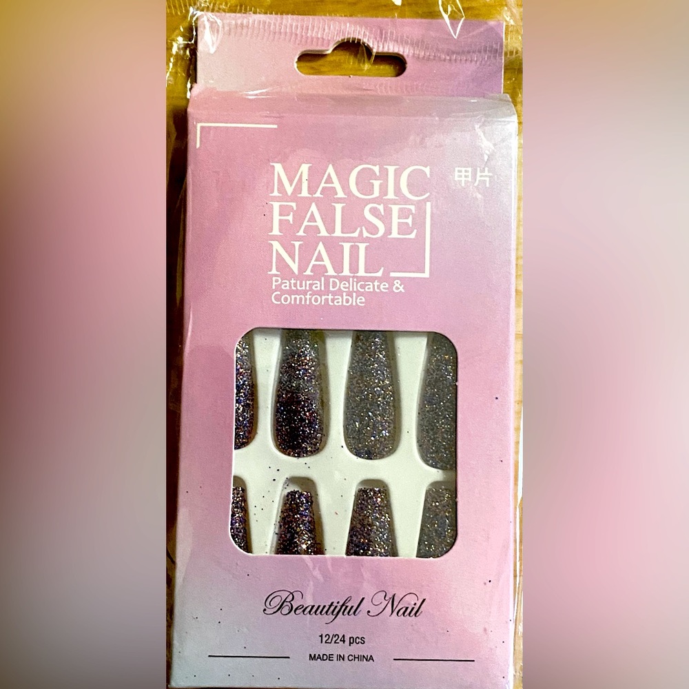Purple glitter press-on nails.
